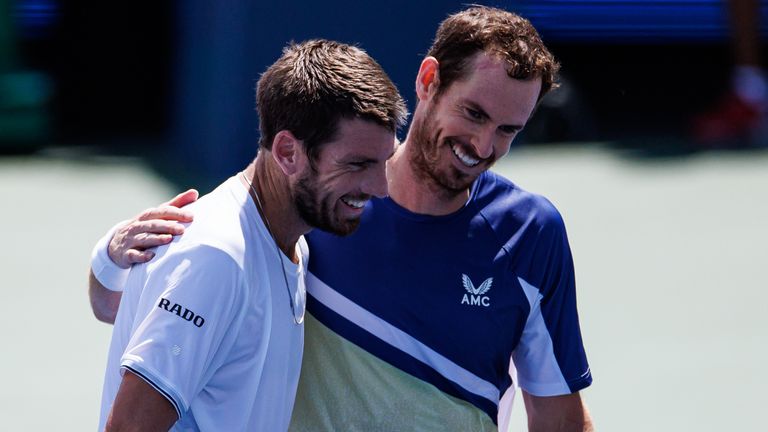 Cameron Norrie of Great Britain embraces Andy Murray of Great Britain after beating him in the second round of the men&#39;s singles at the Lindner Family Tennis Center on August 17, 2022 in Mason, Ohio. (Photo by Frey/TPN/Getty Images)