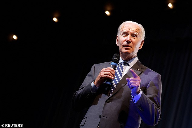 President Joe Biden speaks to the overflow crowd Thursday night at the Richard Montgomery High School in Rockville, Maryland