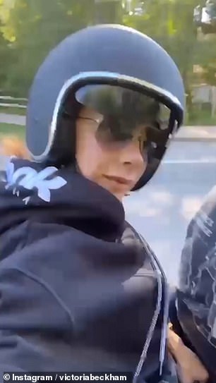 Chilled: She looked casual for the trip out in a black hoodie and sunglasses while donning her helmet for safety reasons