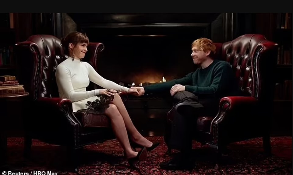 Emma Watson (left) and Rupert Grint (right) share a heartwarming moment during the film reunion