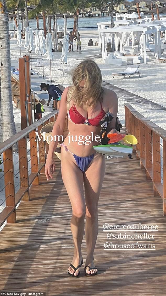 Family vacay: Chloë showed the realities of mom life as she hit the beach with her son Vanja, two, during a family break in June in Mexico