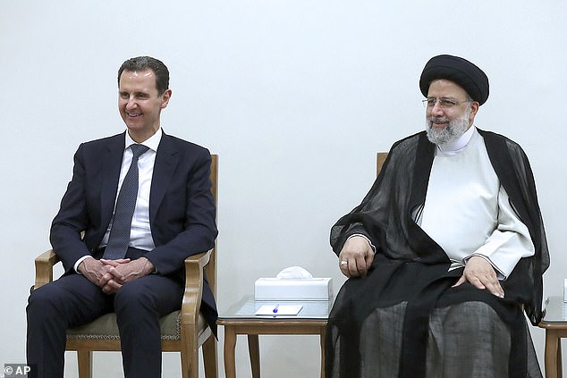 Syrian President Bashar Assad, left, attends a meeting with Iran's Supreme Leader Ayatollah Ali Khamenei. Since the 2015 deal, Iranian influence has grown in war-torn Syrian