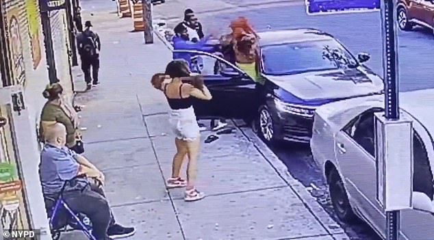 The incident, which transpired Saturday, saw the 26-year-old suspect, identified Monday as Kiani Phoenix (seen here in the green), fatally strike Milton Storch (pictured sitting on his walker) with her car in Rockaway, sparking a two-day manhunt after she fled the scene.