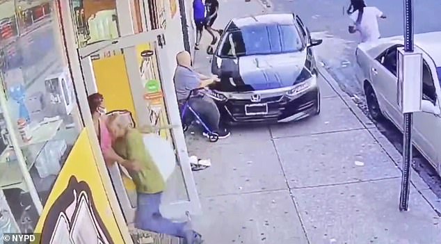 Milton Storch, of Far Rockaway, NY, seated in his walker, turns just as the car strikes him. He was killed by the impact