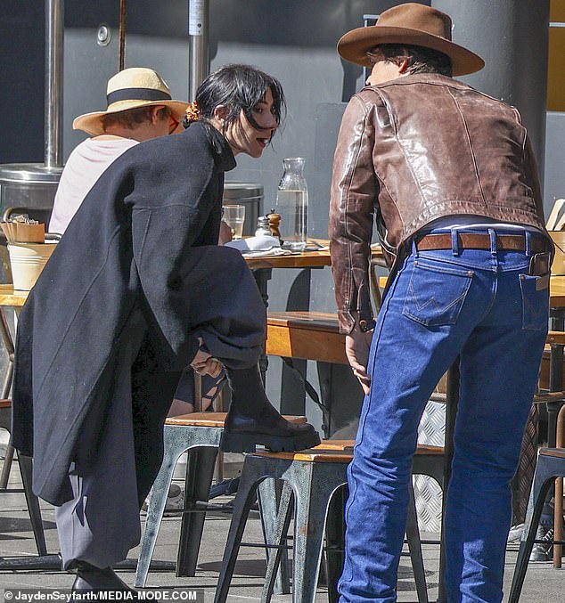 The Veronicas star and her partner both donned stylish, high fashion looks for the casual outing in Sydney's upmarket suburb of Double Bay