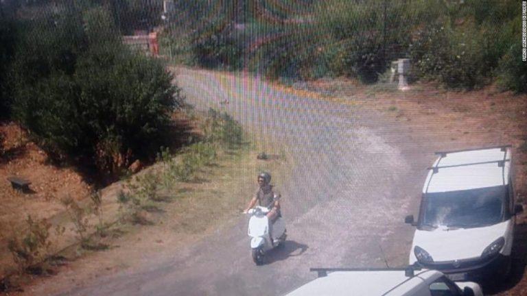 Tourist rides moped around Pompeii