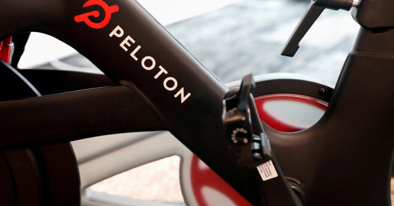 Peloton, struggling to sell its gear, reports a $1.2 billion loss.