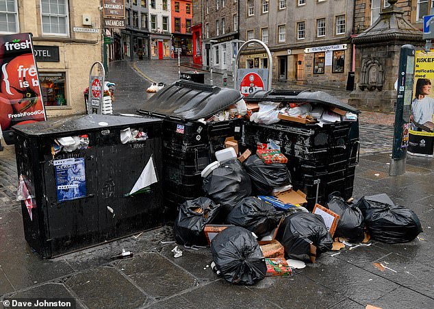 Bins overflow with rubbish in Edinburgh as binmen begin 12-day strike demanding higher pay