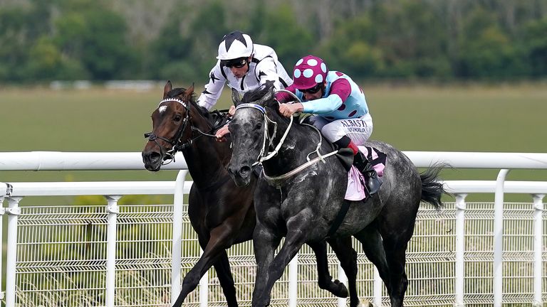 Internationalangel (near side) and Oscula battle it out at Goodwood