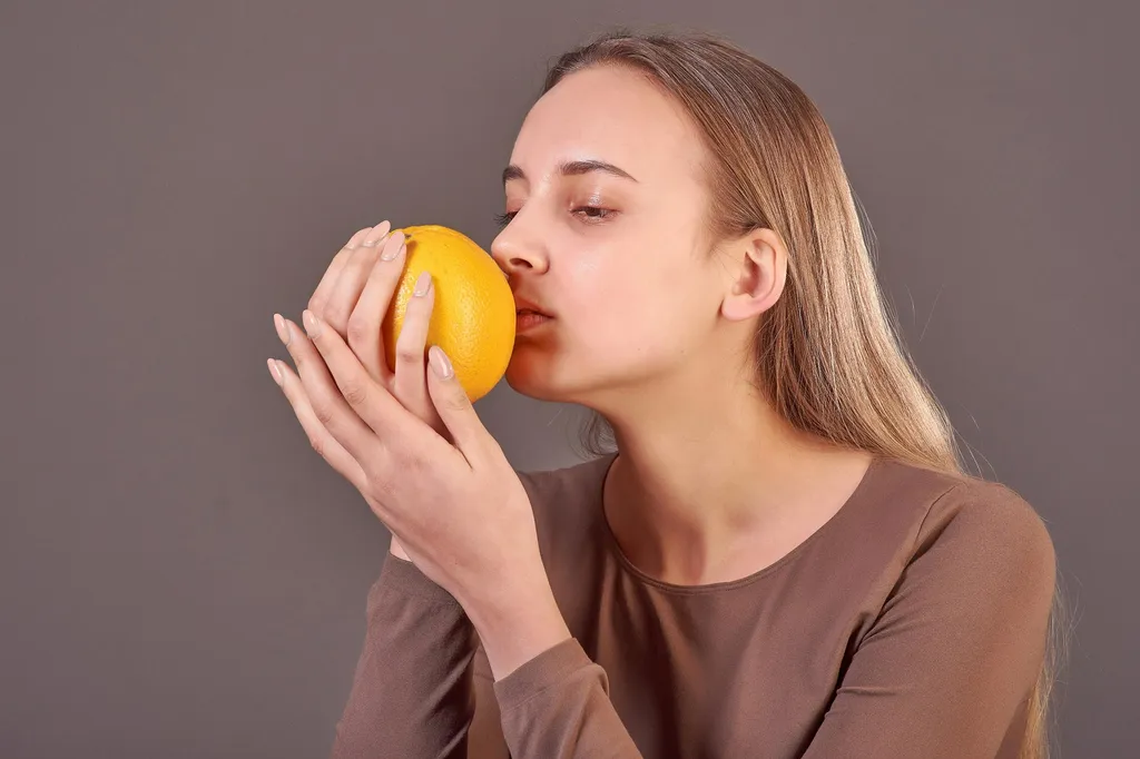 Sniffing Smelling Orange