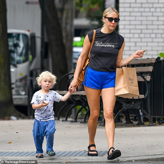 Chloe Sevigny, 47, showcases her fit figure while out with son Vanja, two, in New York City