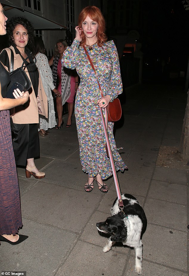 Christina Hendricks pulls off casual chic along with her dog in London