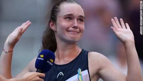 Snigur reacts after defeating Halep at the US Open.