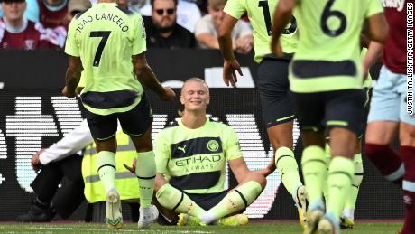 Haaland celebrates after scoring the opening goal from the penalty spot against West Ham. 