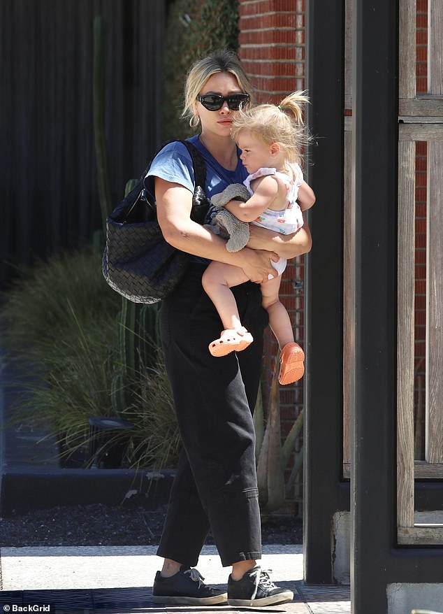 Hilary Duff shops in LA with husband Matthew Koma and their daughters Banks, three, and Mae, one