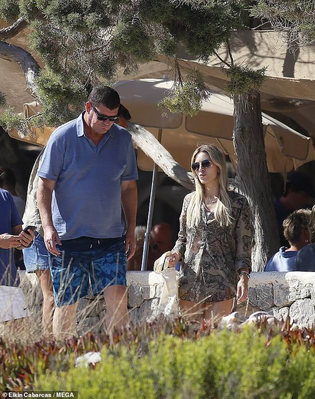 James Packer chats to a mystery blonde in Ibiza after 33kg weight loss