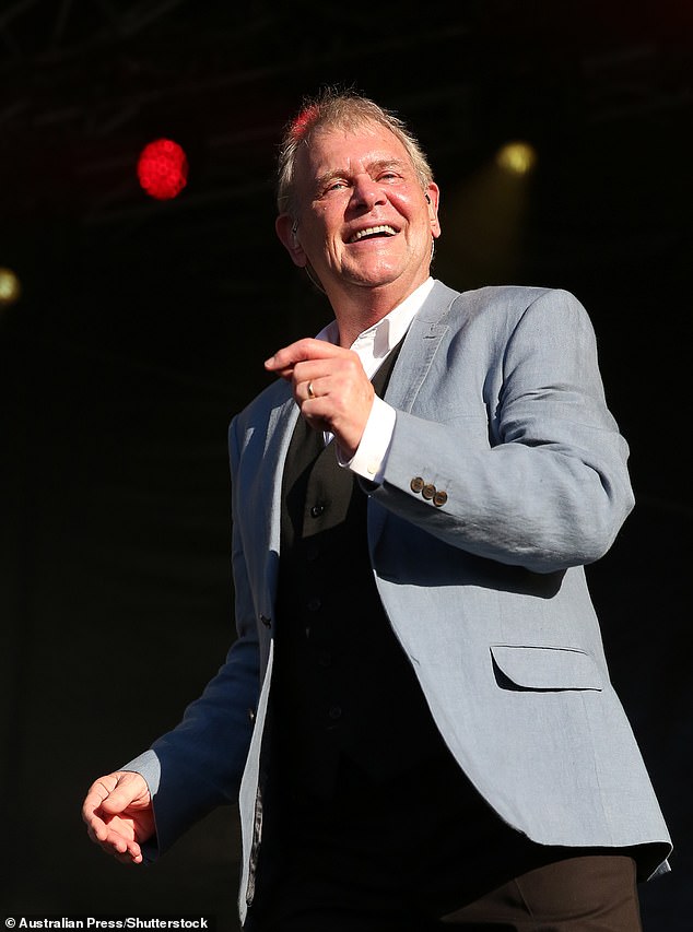 John Farnham still in intensive care after undergoing a operation to remove cancer