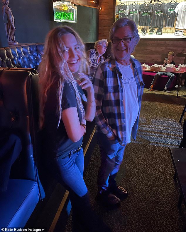 Kate Hudson is joined by her stepfather Kurt Russell while watching her eldest son Ryder play a show