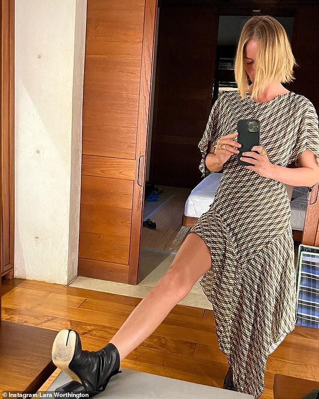 Lara Worthington suffers a rare fashion fail as she models bizarre camel toe boots