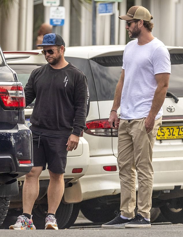 Liam and Luke Hemsworth go incognito on the streets of Byron Bay as the famous brothers run errands