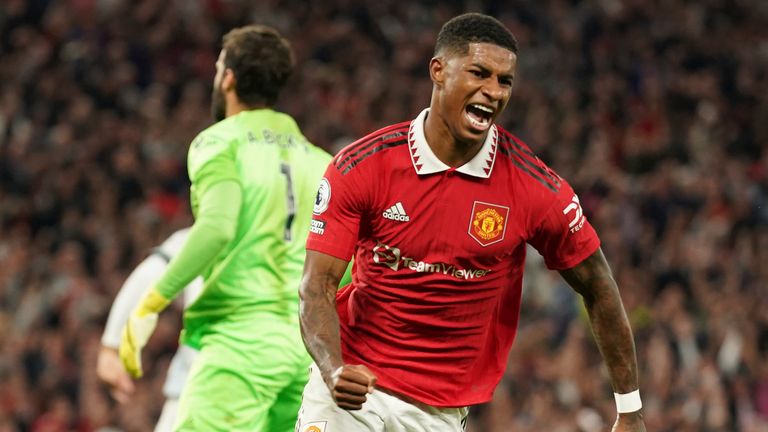 Manchester United&#39;s Marcus Rashford celebrates after scoring against Liverpool