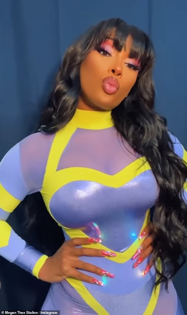 Megan Thee Stallion wows in a figure hugging blue jumpsuit at Summer Sonic Festival