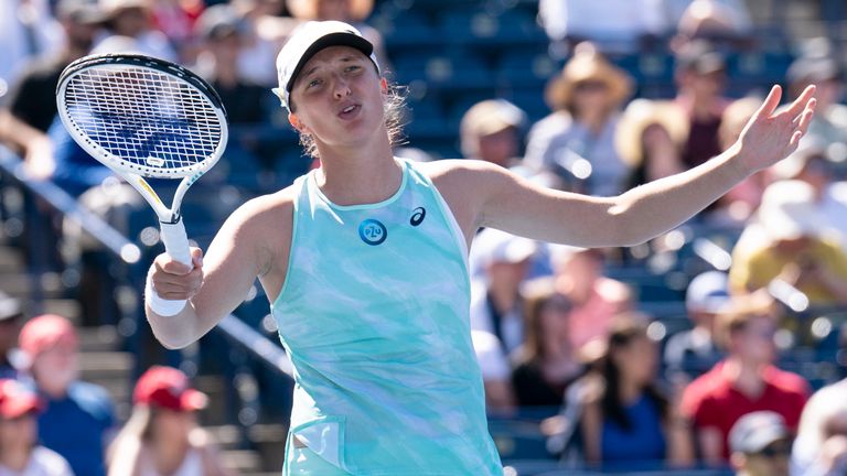 Iga Swiatek reacts during her defeat to Beatriz Haddad Maia in National Bank Open tennis action in Toronto, Thursday, August 11, 2022. (Chris Young//The Canadian Press  via AP)