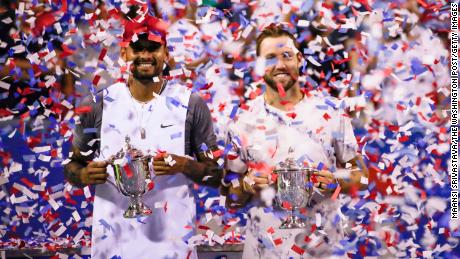 Kyrgios and Sock celebrate winning the doubles title at the Citi Open.