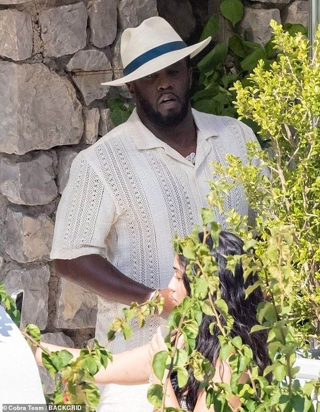 P Diddy enjoys leisurely lunch with bevy of bikini-clad beauties in Italy