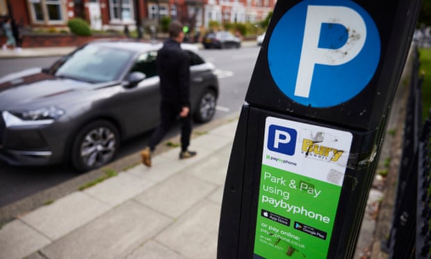 A sign on a pay-and-display parking meter in Bury, Greater Manchester, informs motorists that they can also pay using PayByPhone, one of the UK’s most successful parking apps.