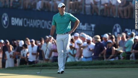 McIlroy of Northern Ireland waits to putt on the 18th green during the third round Saturday.