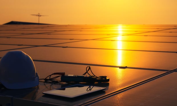 Equipment with solar panels or solar cells on the roof of a house