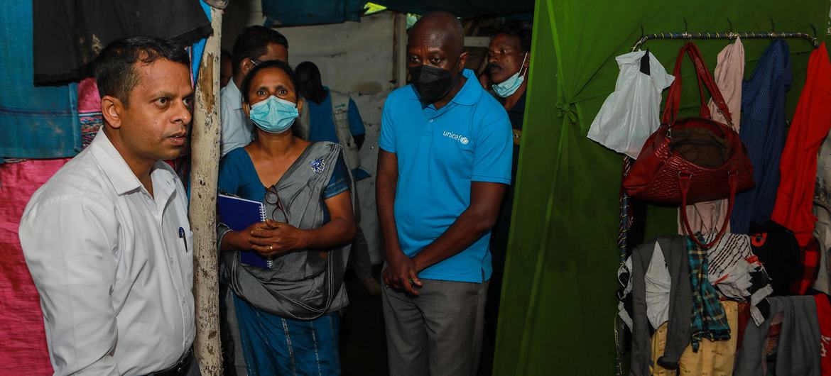 George Laryea-Adjei, Regional Director for South Asia (right) visits the home of a family in Watawala, Sri Lanka.