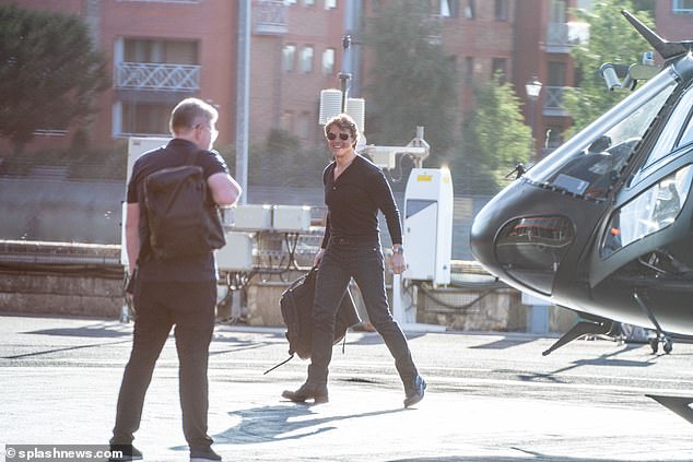 Tom Cruise lives up to reputation by arriving in London by helicopter while filming new movie