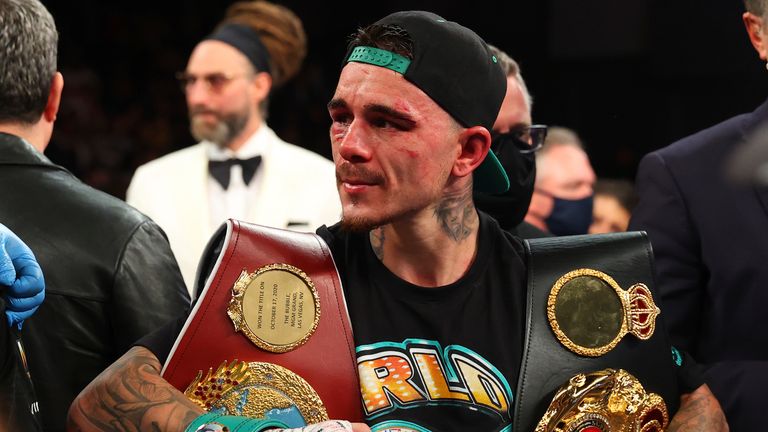 George Kambosos Jr poses with the belts he won after his championship bout for Lopez&#39;s Undisputed Lightweight title at The Hulu Theater at Madison Square Garden on November 27, 2021 in New York, New York