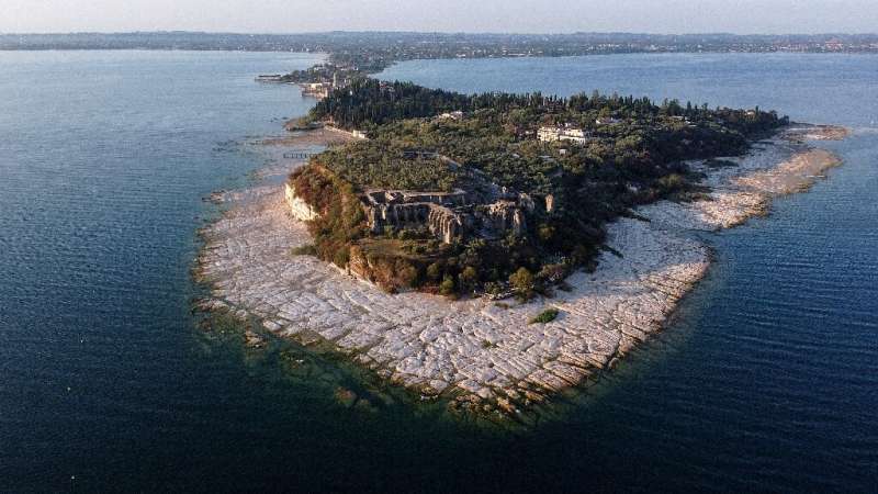 An aerial view shows how low the waters are off the peninsula of Sirmione on Lake Garda