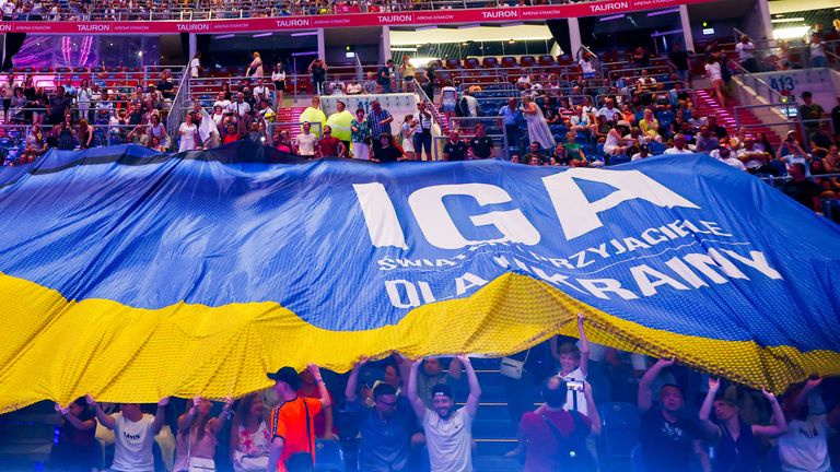 The audience holds a huge Ukrainian flag during &#39;Iga Swiatek & Friends for Ukraine&#39; charity event in Tauron Arena in Krakow, Poland on July 23, 2022. The total income from ticket sales, 2 million PLN (EUR 422,000), will be donated to the children affected by the war in Ukraine. (Photo by Beata Zawrzel/NurPhoto)