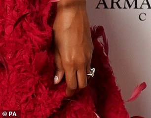 Intriguing: She was still wearing the engagement ring earlier this month