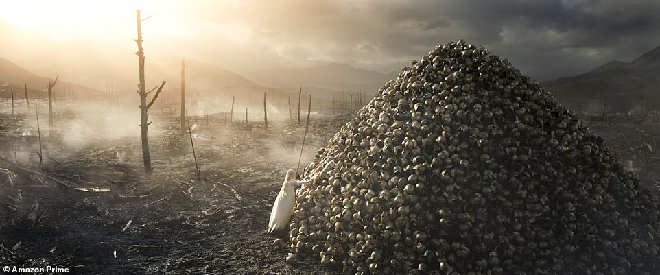 Helmet pile: Galadirel is dwarfed by the pile of helmets representing the fallen soldiers