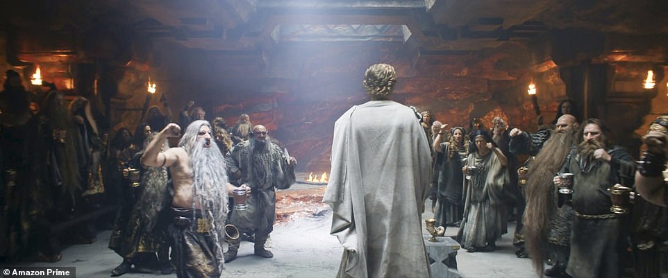 Inside: The dwarves lead Elrond inside the majestic land, as dwarves start chanting at his arrival as he's lead to Durin