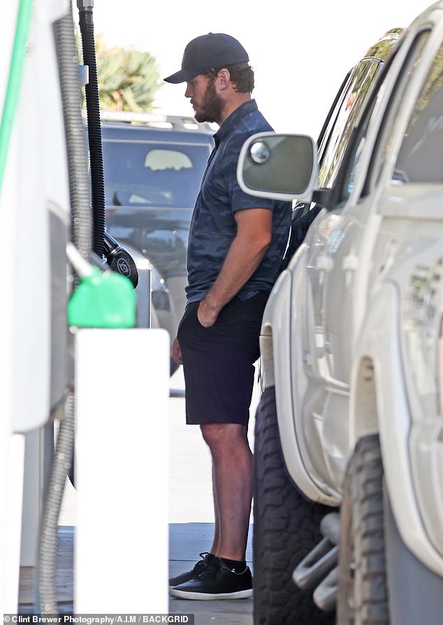 She didn't work out at the pump: His wife of three years, 32-year-old Katharine Schwarzenegger, stayed in the car as the actor filled up the tank