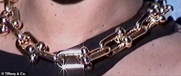 Golden girl: The megastar wore a necklace 'specifically designed for her' from Tiffany & Co., called Lock and Victoria