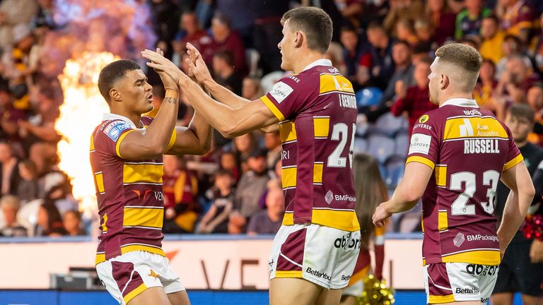 Innes Senior celebrates a try for Huddersfield against Wakefield