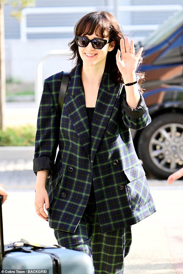 Stylish: The actress looked chic in a green plaid suit