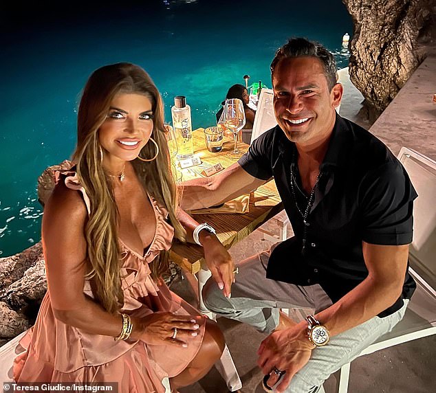 Back and forth: The 50-year-old reality television personality's photos had been taken in both Positano, Italy, and an unspecified beach location, and she made a point of visibly showing her affection for her new husband in nearly all of her posts