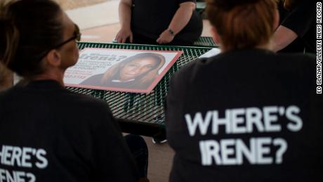 A group formed to help find Irene Gakwa prepares to post signs seeking information about the missing woman  in Gillette, Wyoming, on June 18. 