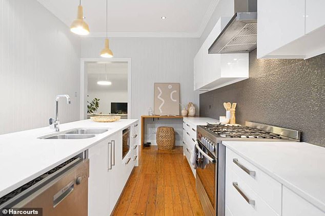 Built in 1910, the home includes ornate ceilings and leadlight windows