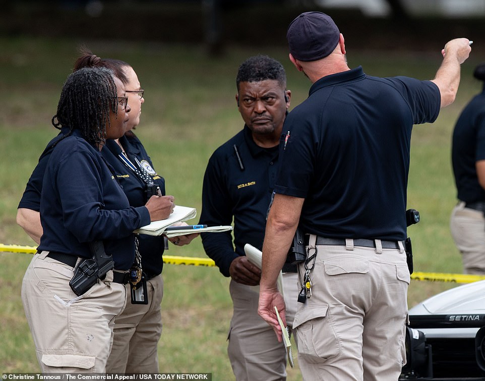 Members of law enforcement work the scene where Eliza Fletcher, 34, is believed to have been kidnapped around 4:30 a.m. on Friday, near the corner Central Avenue and Zach H. Curlin Street.