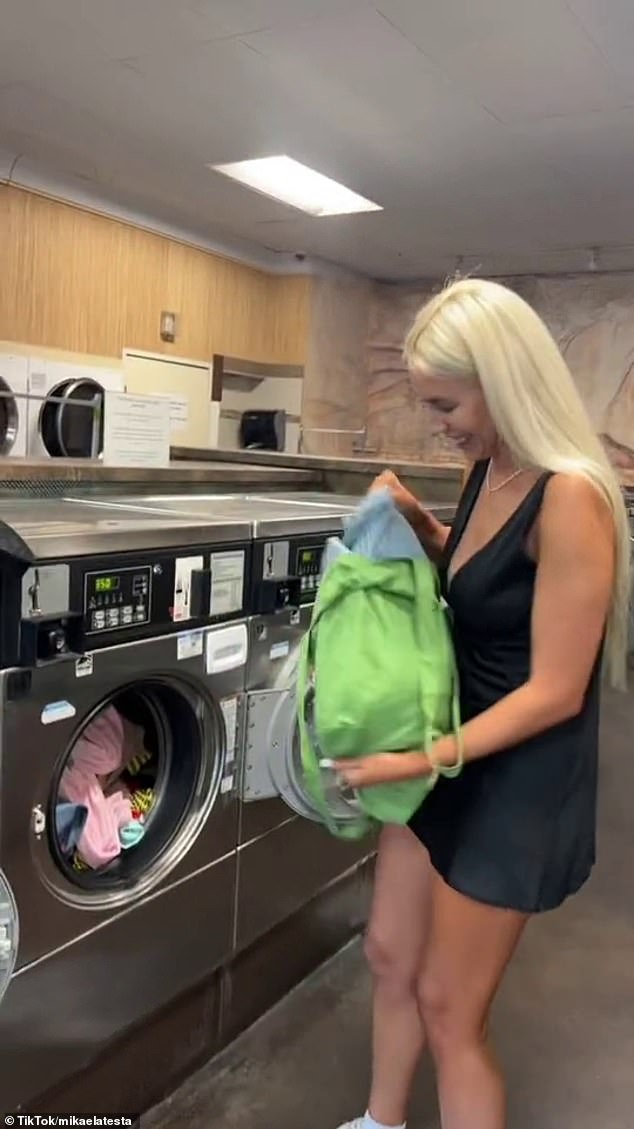 Mikaela was hesitant to visit a laundromat because she wasn't sure it was 'safe', but a fellow customer, Alecia (pictured), helped her use a washing machine for the first time