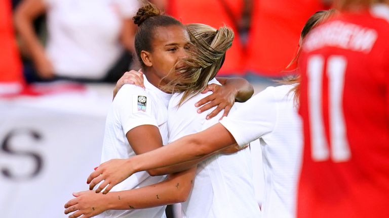 England&#39;s Nikita Parris (centre) celebrates with her team-mates Ella Toone and Georgia Stanway